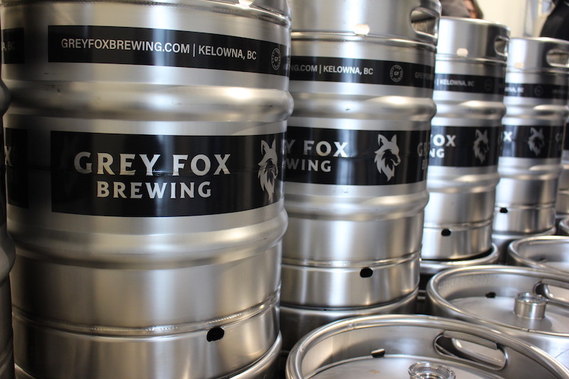 Grey Fox branded kegs stacked